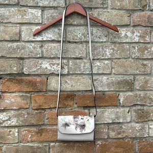 Simply Vera Vera wang crossbody, pastel purple floral print.